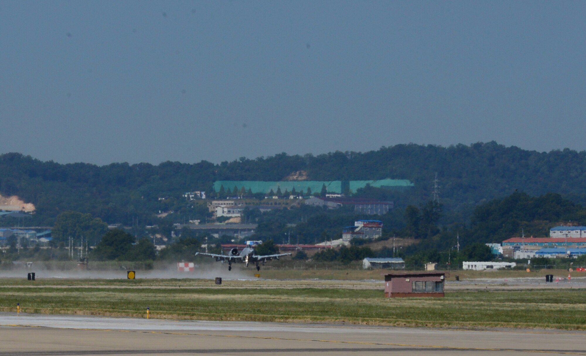 An A-10 Thunderbolt II assigned to the 25th Fighter Squadron lands at Osan Air Base, Republic of Korea, Sept. 15, 2015. Aircraft and members of the 25th FS have been working out of Suwon Air Base for the last six weeks. (U.S. Air Force photo by Staff Sgt. Benjamin Sutton)