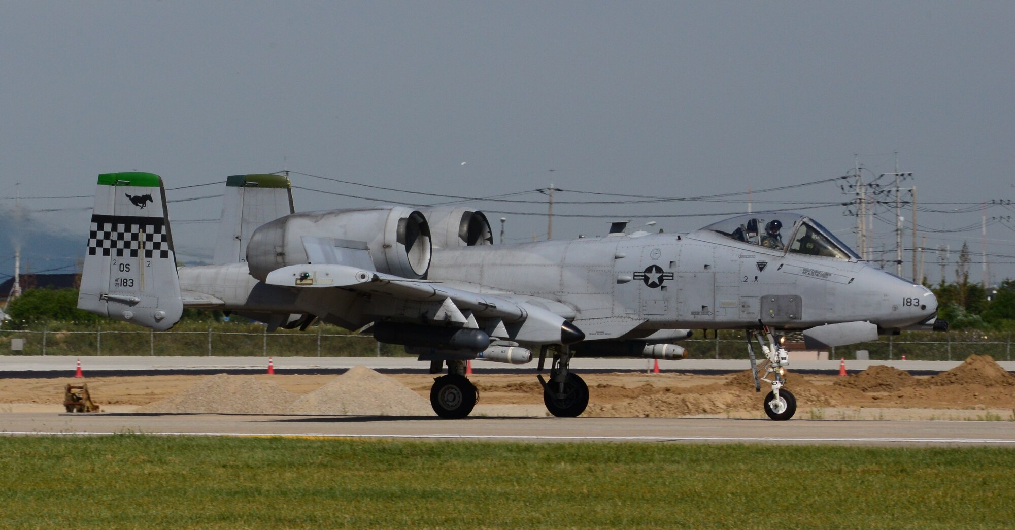 An A-10 Thunderbolt II assigned to the 25th Fighter Squadron taxis along the newly constructed runway at Osan Air Base, Republic of Korea, Sept. 15, 2015.  U.S. Air Force civil engineers and local Korean contractors conducted repairs at Osan returning the runway to full operational status in less than two months. (U.S. Air Force photo by Staff Sgt. Benjamin Sutton) 