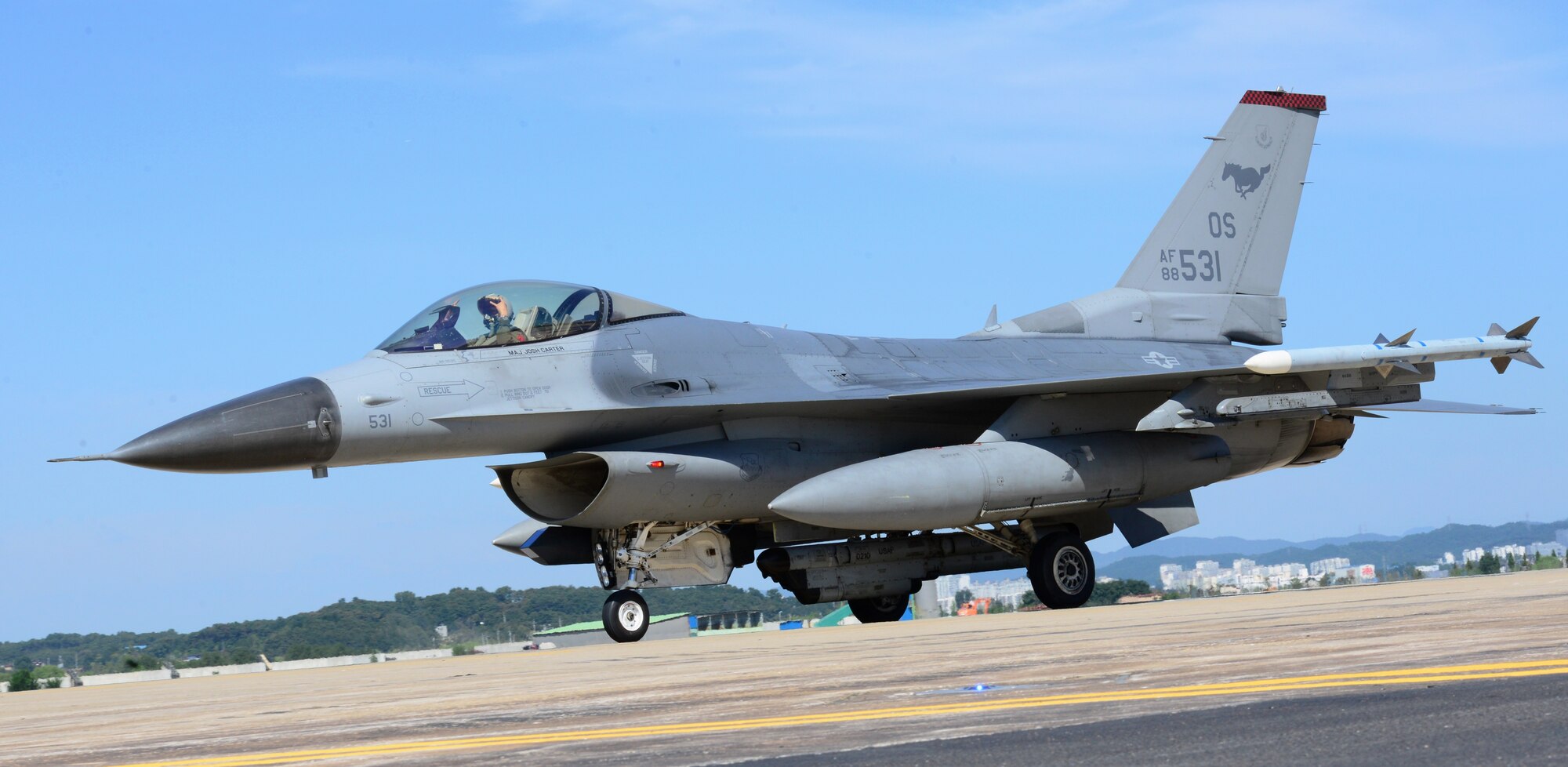 An F-16 Fighting Falcon assigned to the 36th Fighter Squadron taxis along the new runway at Osan Air Base, Republic of Korea, Sept. 15, 2015. While runway repairs were being conducted here the squadron temporarily operated from Suwon Air Base. (U.S. Air Force photo by Staff Sgt. Benjamin Sutton)