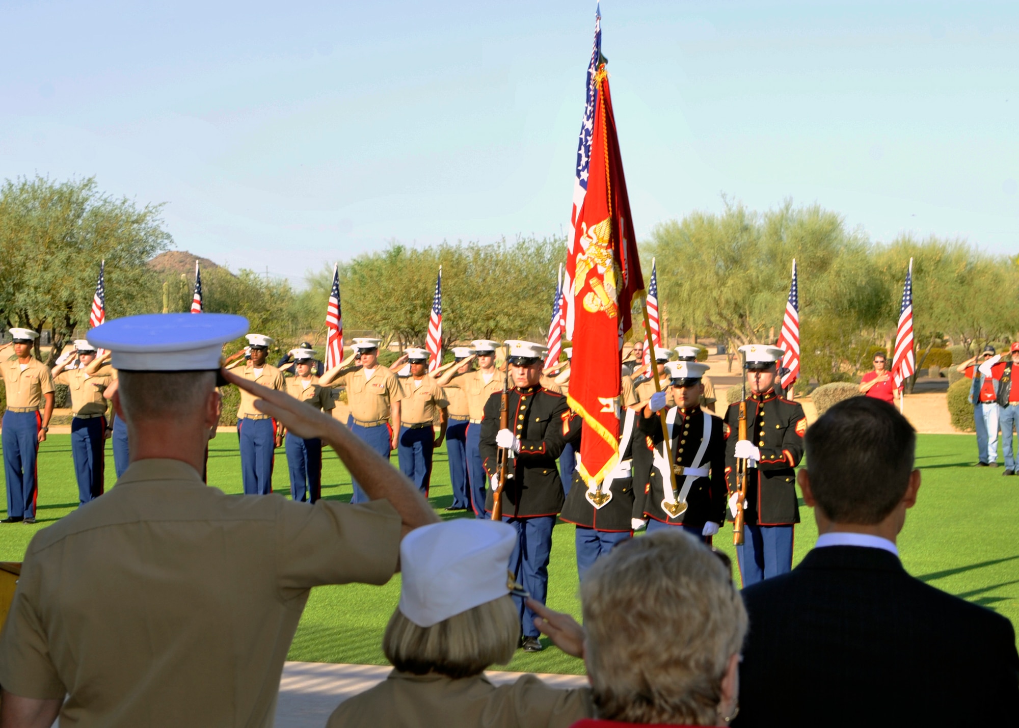 Marines from Bulk Fuel Company “C” post the colors during the September 11 Memorial Ceremony at the Arizona National Memorial Cemetery during Marine Week in Phoenix, Arizona. The Marine Corps treated Arizonians to a week of performances, demonstrations and equipment and aircraft showcases. (U.S. Air Force photo by Staff Sgt. Marcy Copeland)