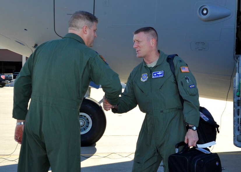 Col. David Shoemaker, 56th Fighter Wing vice commander, shakes hands with a member of the Dover Air Force Base Honorary Commanders September 16, 2015, at Luke Air Force Base, Arizona. The Honorary Commanders arrived for a community relations tour to learn about the different missions at Luke and Davis-Monthan Air Force Base. (U.S. Air Force photo by Staff Sgt. Marcy Copeland)