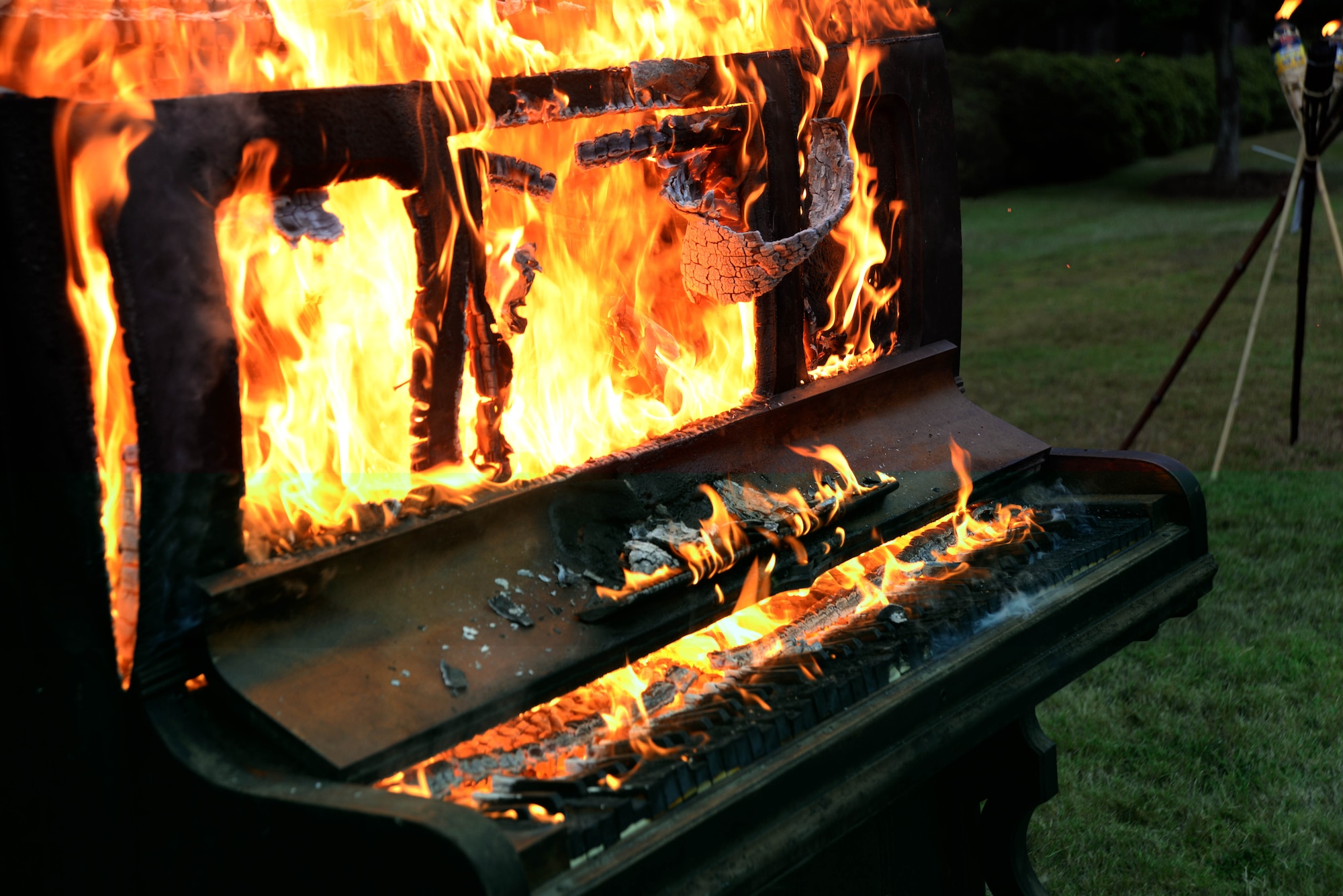 A piano goes up in flames during the celebration to commemorate the 75th anniversary of the Battle of Britain Sept. 11, 2015, at Maxwell Air Force Base, Alabama. Piano burning started as a Royal Air Force between World War I and World War II.  Although the history of its origin is unclear, it is often used to commemorate the Battle of Britain or a fallen comrade. (U.S. Air Force photo Airman 1st Class Alexa Culbert/Cleared)