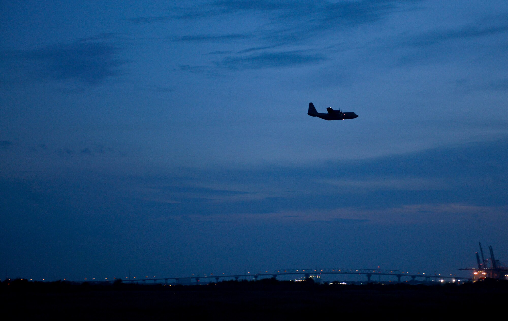 A C-130 Hercules Aircraft from the 757th Airlift Squadron, an Air Force Reserve unit from Youngstown, OH, conducts a dry run for the mosquito aerial spray over Joint Base Charleston - Weapons Station in Charleston, South Carolina, Sept. 11, 2015. Aerial spray flight proficiency training was also accomplished while providing a beneficial reduction in mosquito populations affecting the health and welfare of the people at Joint Base Charleston. (U.S. Air Force photo/Airman 1st Class Thomas T. Charlton)