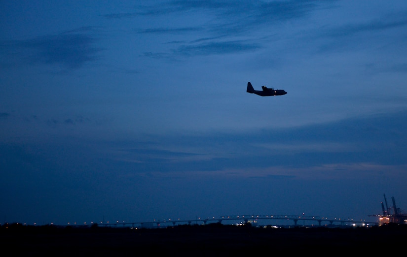 A C-130 Hercules Aircraft from the 757th Airlift Squadron, an Air Force Reserve unit from Youngstown, OH, conducts a dry run for the mosquito aerial spray over Joint Base Charleston - Weapons Station in Charleston, South Carolina, Sept. 11, 2015. Aerial spray flight proficiency training was also accomplished while providing a beneficial reduction in mosquito populations affecting the health and welfare of the people at Joint Base Charleston. (U.S. Air Force photo/Airman 1st Class Thomas T. Charlton)