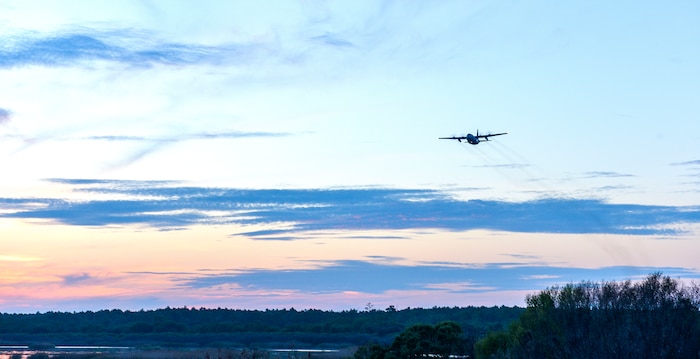 A C-130 Hercules Aircraft from the 757th Airlift Squadron, an Air Force Reserve unit from Youngstown, OH, conducts a dry run for the mosquito aerial spray over Joint Base Charleston - Weapons Station in Charleston, South Carolina, Sept. 11, 2015. Aerial spray flight proficiency training was also accomplished while providing a beneficial reduction in mosquito populations affecting the health and welfare of the people at Joint Base Charleston. (U.S. Air Force photo/Airman 1st Class Thomas T. Charlton)