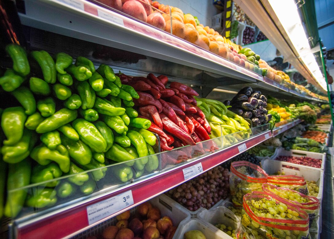 Fresh fruit and vegetables sit on the shelves at the newly opened Arkadas Market Sept. 8, 2015, at Incirlik Air Base, Turkey. The market does not charge the value added tax to their items, making items cheaper for the Airmen and families stationed at Incirlik AB. (U.S. Air Force photo by Airman 1st Class Cory W. Bush/Released)