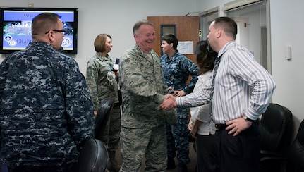 Chaplain (Col.) James Tims, Air Mobility Command chaplain, meets with the Air Base chapel staff Sept. 14, 2015, at the Air Base chapel on Joint Base Charleston – Air Base, S.C. Tims was visiting JB Charleston to meet with the Air Base and Weapons Station chaplains and staff to see the mission firsthand. (U.S. Air Force photo/Airman 1st Class Clayton Cupit)