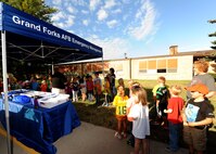 Larimore Elementary School students listen as Shawn W. Leach, 319th Civil Engineer Squadron emergency management specialist, speaks about preparedness Sept. 16, 2015, in Larimore, North Dakota. Grand Forks Air Force Base Emergency Management was scheduled to make 12 school visits in the local area during National Preparedness Month. (U.S. Air Force photo by Airman 1st Class Ryan Sparks/Released)