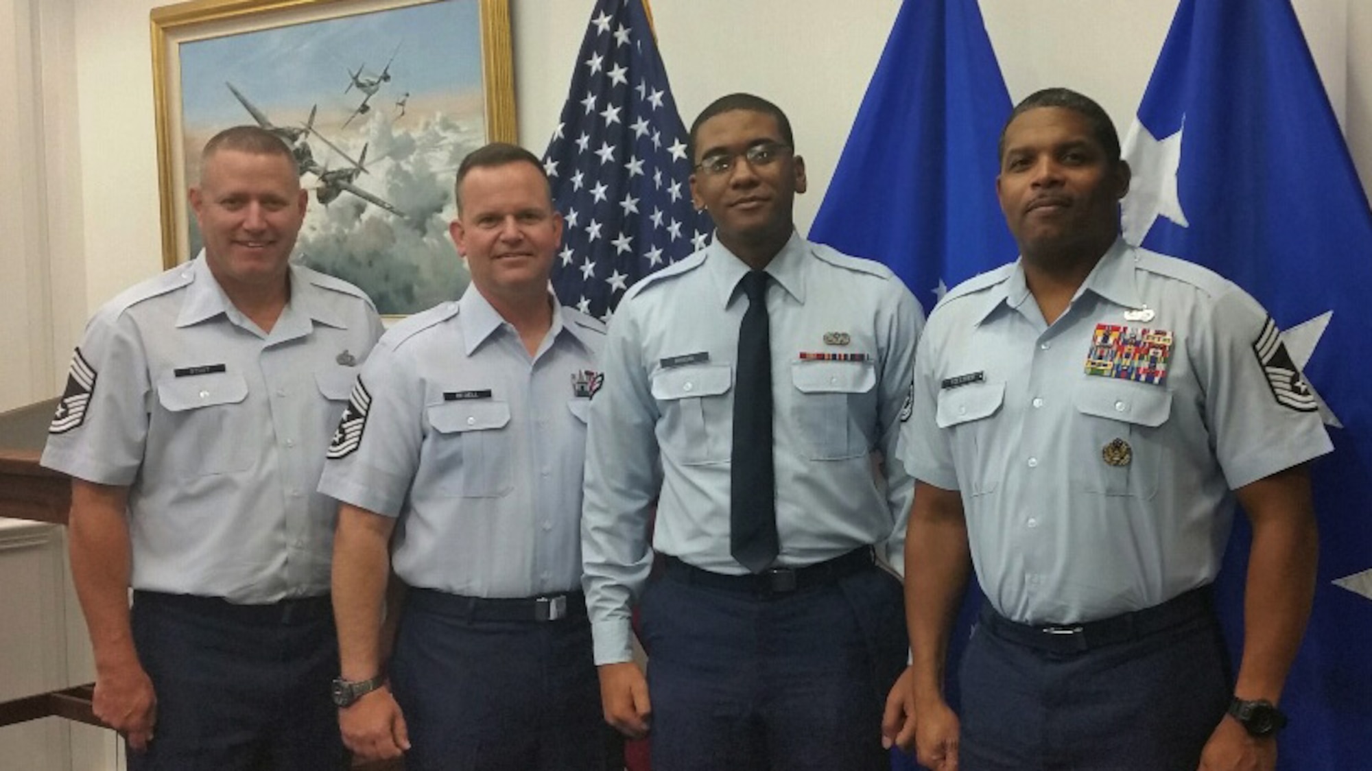Chief Master Sgt. Bo Stout, U.S. Air Force Headquarters paralegal career field manager, Chief Master Sgt. Robert Bedell, 30th Space Wing command chief, Airman 1st Class Cardell Morgan, 30th SW Judge Advocate civil law paralegal and Chief Master Sgt. Larry Tolliver, senior paralegal manager to the Judge Advocate General, pose for a photo, Sept. 8, 2015, Washington, D.C. Morgan was recently selected to attend a trip to Capitol Hill with Col. Christopher Moss, 30th Space Wing commander and Chief Master Sgt. Robert Bedell, 30th SW command chief, to meet with Congressional representatives for the Central Coast. (courtesy photo)
