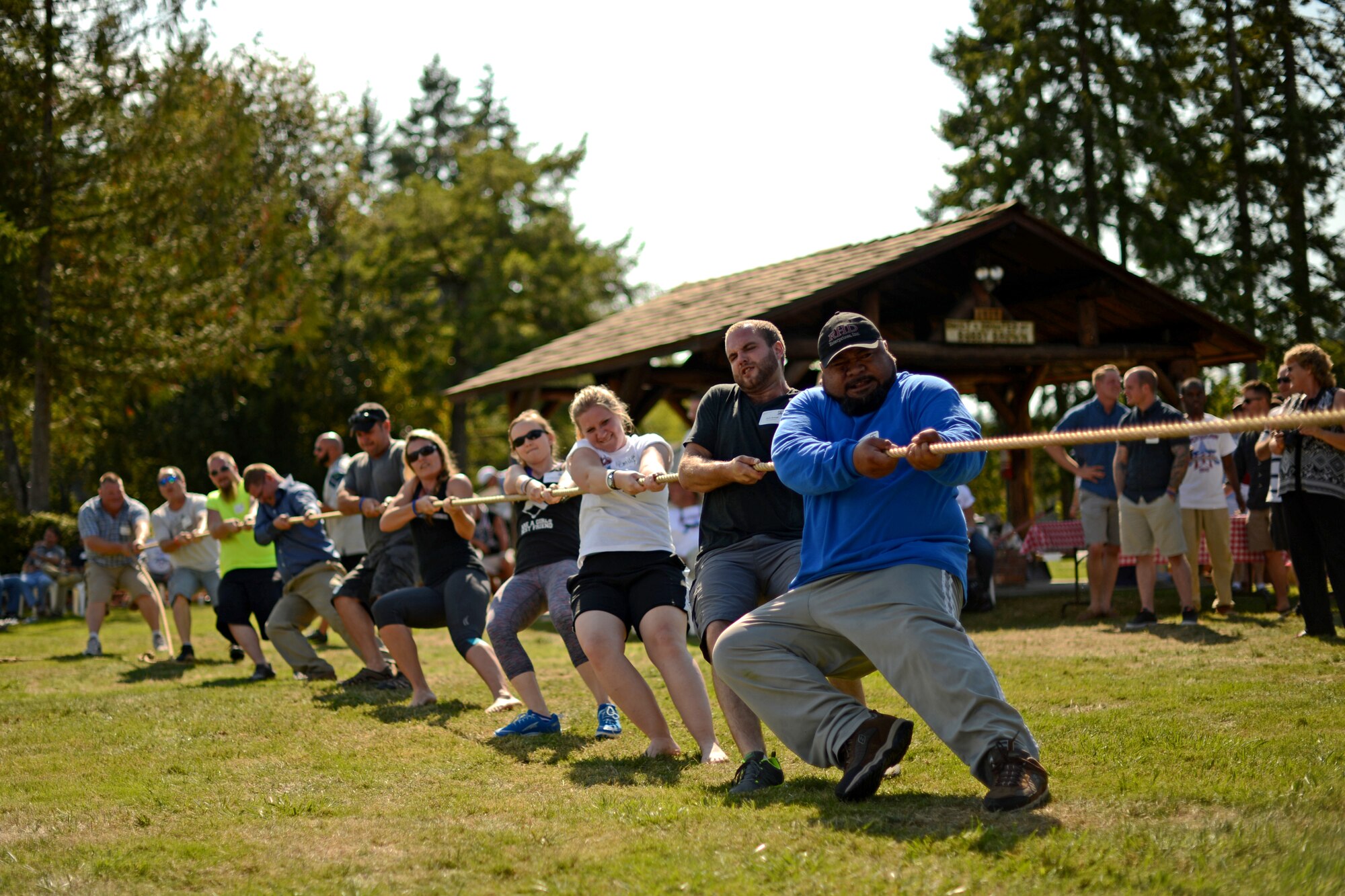 Foofaraw attendees compete during a game of tug of war Sept. 11, 2015, during Foofaraw at the Olympia Yacht Club Island Home, Wash. During Foofaraw, a military appreciation event provided by the Olympia Yacht Club and the Thurston County Chamber of Commerce, the tug of war was the culminating event where teams challenged each other and ended with the winning team challenging the yacht club members. (U.S. Air Force photo/Staff Sgt. Tim Chacon)