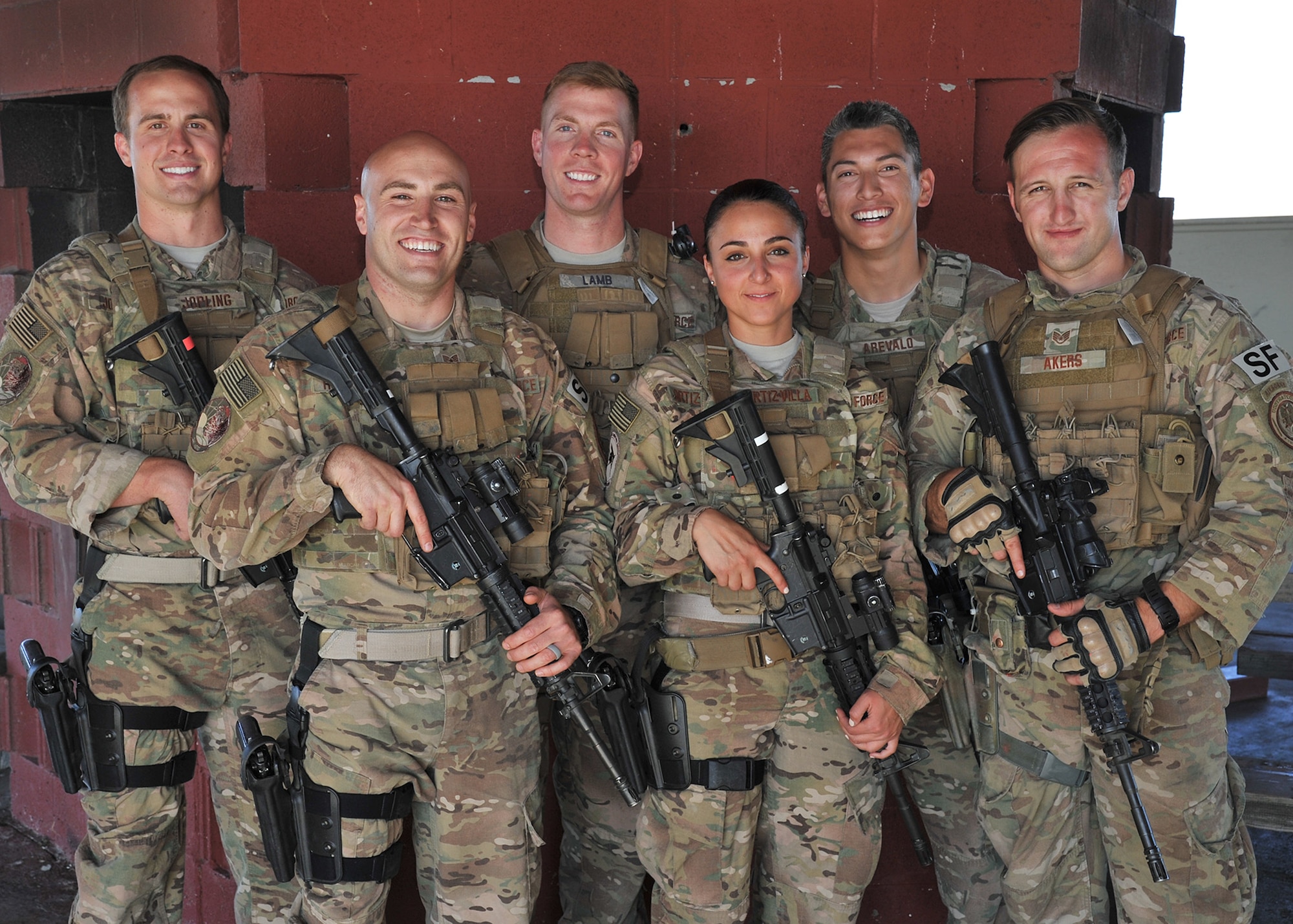 The 341st Missile Wing’s Global Strike Challenge 2015 Security Forces team pauses during training Sept. 10, 2015, at Malmstrom Air Force Base, Mont. From left to right are 1st Lt. Jonathan Jopling, team member; Tech. Sgt. Anthony Richards, team leader; Senior Airman William Lamb, team member; Airman 1st Class Jessica Ortiz-Villa, team member; Senior Airman Tyler Arevalo, team member; and Staff Sgt. Bradley Akers, team member. The 341st MW will defend its claim to the Charlie Fire Team Trophy for Best Security Forces when Malmstrom competes at Camp Guernsey, Wyo., Sept. 21-25 against 12 similar teams from across the Air Force. (U.S. Air Force photo/John Turner)