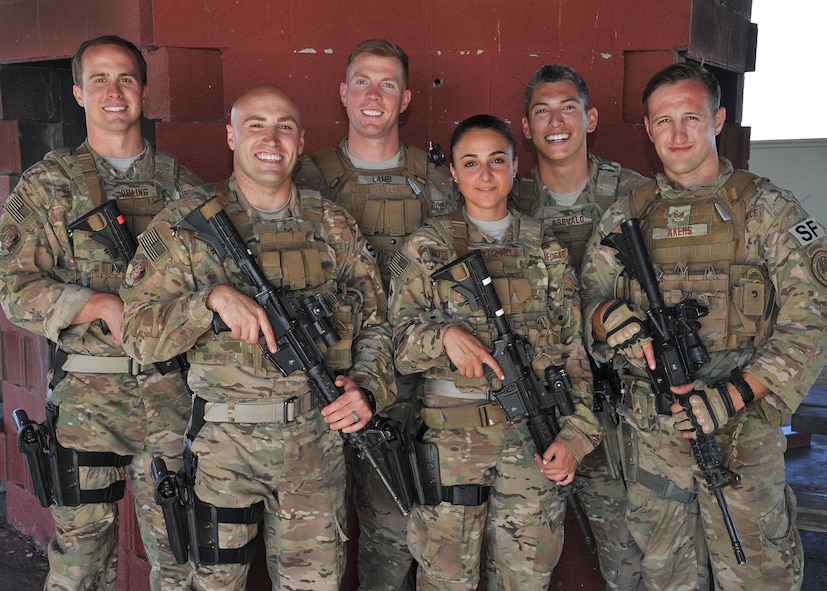 The 341st Missile Wing’s Global Strike Challenge 2015 Security Forces team pauses during training Sept. 10, 2015, at Malmstrom Air Force Base, Mont. From left to right are 1st Lt. Jonathan Jopling, team member; Tech. Sgt. Anthony Richards, team leader; Senior Airman William Lamb, team member; Airman 1st Class Jessica Ortiz-Villa, team member; Senior Airman Tyler Arevalo, team member; and Staff Sgt. Bradley Akers, team member. The 341st MW will defend its claim to the Charlie Fire Team Trophy for Best Security Forces when Malmstrom competes at Camp Guernsey, Wyo., Sept. 21-25 against 12 similar teams from across the Air Force. (U.S. Air Force photo/John Turner)