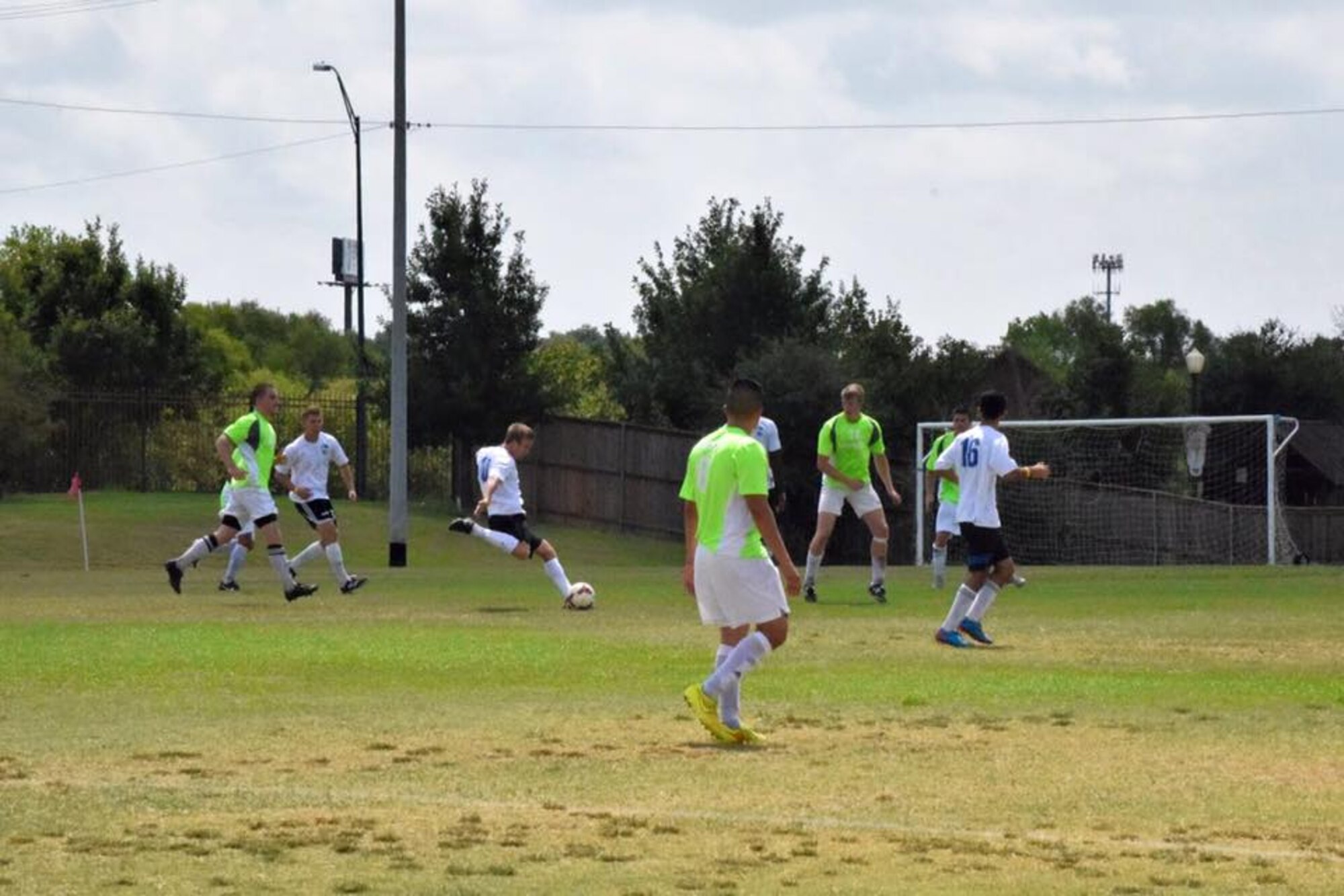 Columbus Football Club’s midfielder Capt. Michael Pyles, 41st Flying Training Squadron, takes a shot on the goal while playing against the soccer team from Langley Air Force Base, Virginia, during the 2015 Defender's Cup held Sept. 4-7 in San Antonio, Texas. Over 700 athletes participated in the 2015 Defender’s Cup Soccer Tournament, which is open to all branches of the Department of Defense. (Courtesy Photo/Kaitlan Rester)