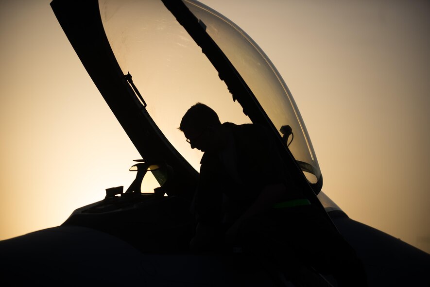 U.S. Air Force Airman 1st Class Dexter Fitzpatrick, 455th Expeditionary Aircraft Maintenance Squadron, preforms a preflight inspection on an F-16 Fighting Falcon aircraft before a combat sortie from Bagram Airfield, Afghanistan, Sept. 15, 2015. The F-16 is a multi-role fighter aircraft that is highly maneuverable and has proven itself in air-to-air and air-to-ground combat. (U.S. Air Force photo by Tech. Sgt. Joseph Swafford/Released)