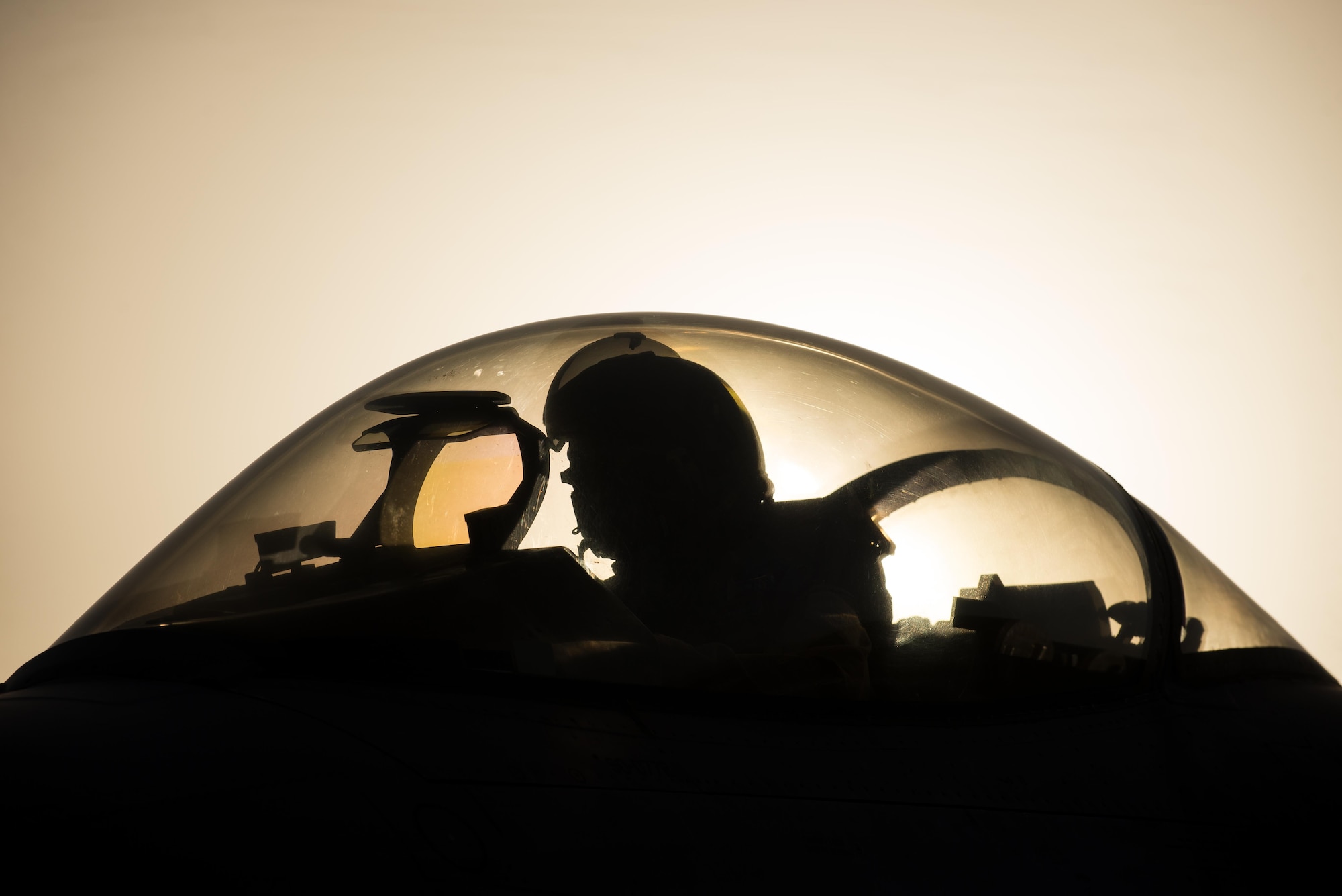 A U.S. Air Force F-16 Fighting Falcon pilot assigned to the 555th Expeditionary Fighter Squadron goes over a preflight inspection before taking off on a combat sortie from Bagram Airfield, Afghanistan, Sept. 15, 2015. The F-16 is a multi-role fighter aircraft that is highly maneuverable and has proven itself in air-to-air and air-to-ground combat. (U.S. Air Force photo by Tech. Sgt. Joseph Swafford/Released)