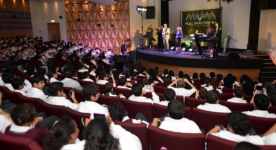 The Air Forces Central Command band plays for a “full house” of students at the Qatar Academy, Doha, Qatar, Sept. 14, 2015. The AFCENT band plays a wide variety of genres to accommodate different types of performances for different types of events. (U.S. Air Force photo by Staff Sgt. Emerson Nuñez/Released)
