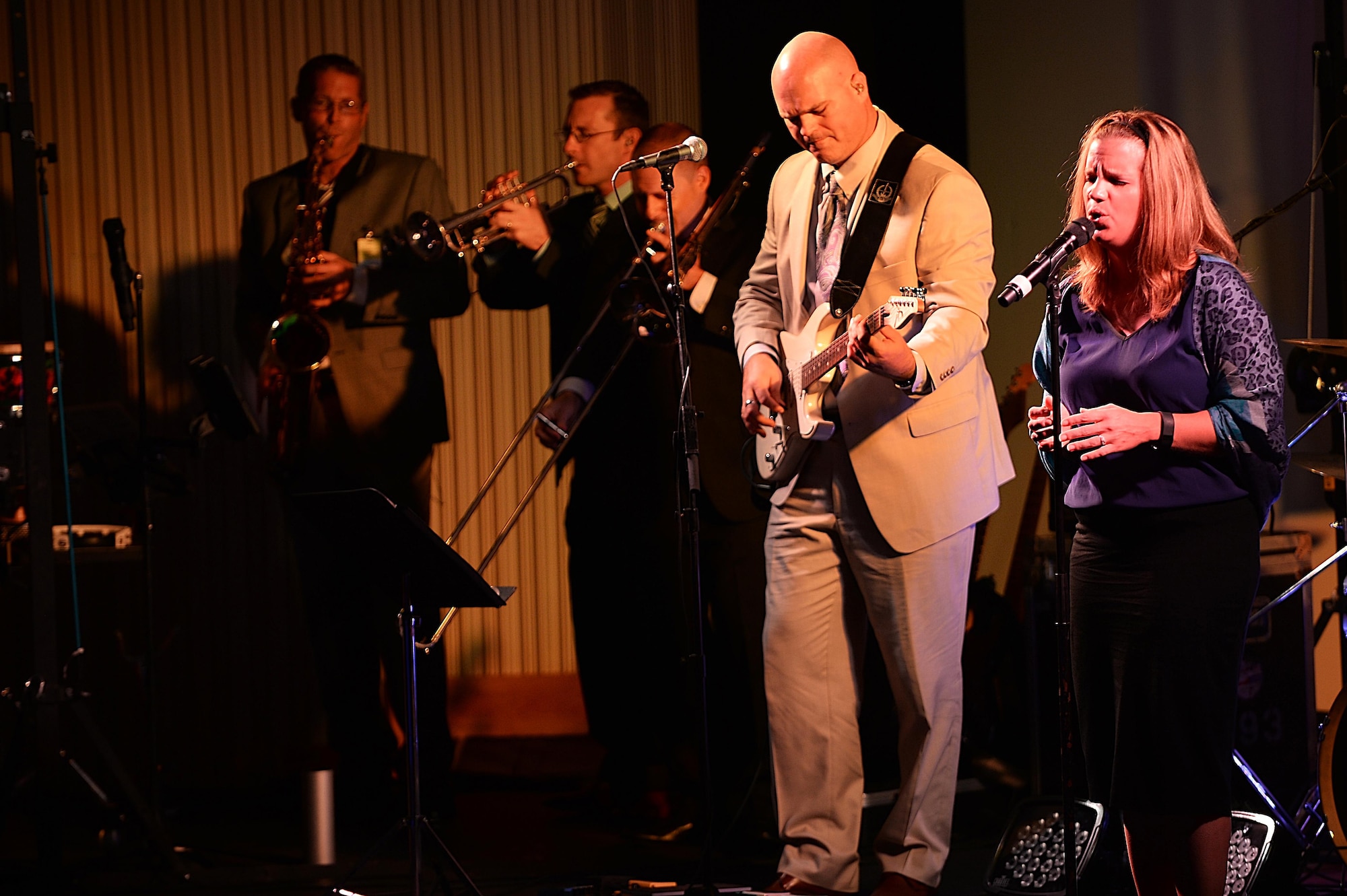 Members of the Air Forces Central Command perform during a concert for students at the Qatar Academy, Doha, Qatar, Sept. 14, 2015. The band plays a variety of genres of music to appeal to all audiences. (U.S. Air Force photo by Staff Sgt. Emerson Nuñez/Released)
