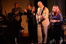 Members of the Air Forces Central Command perform during a concert for students at the Qatar Academy, Doha, Qatar, Sept. 14, 2015. The band plays a variety of genres of music to appeal to all audiences. (U.S. Air Force photo by Staff Sgt. Emerson Nuñez/Released)
