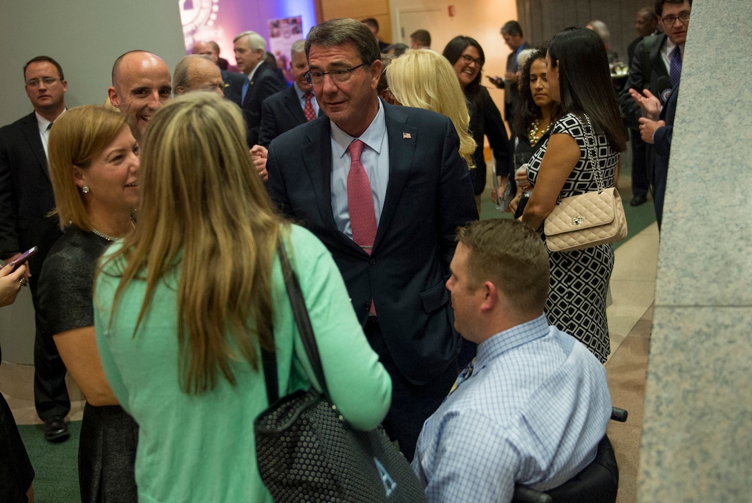 Defense Secretary Ash Carter speaks with guests during the Fisher House's 25th Anniversary Gala reception at the Ronald Reagan Building and International Trade Center in Washington, D.C., Sept. 16, 2015. DoD photo by U.S. Air Force Senior Master Sgt. Adrian Cadiz