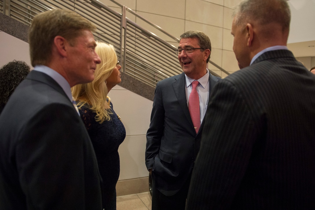 Defense Secretary Ash Carter speaks with guests during the Fisher House's 25th Anniversary Gala reception at the Ronald Reagan Building and International Trade Center in Washington, D.C., Sept. 16, 2015. DoD photo by U.S. Air Force Senior Master Sgt. Adrian Cadiz