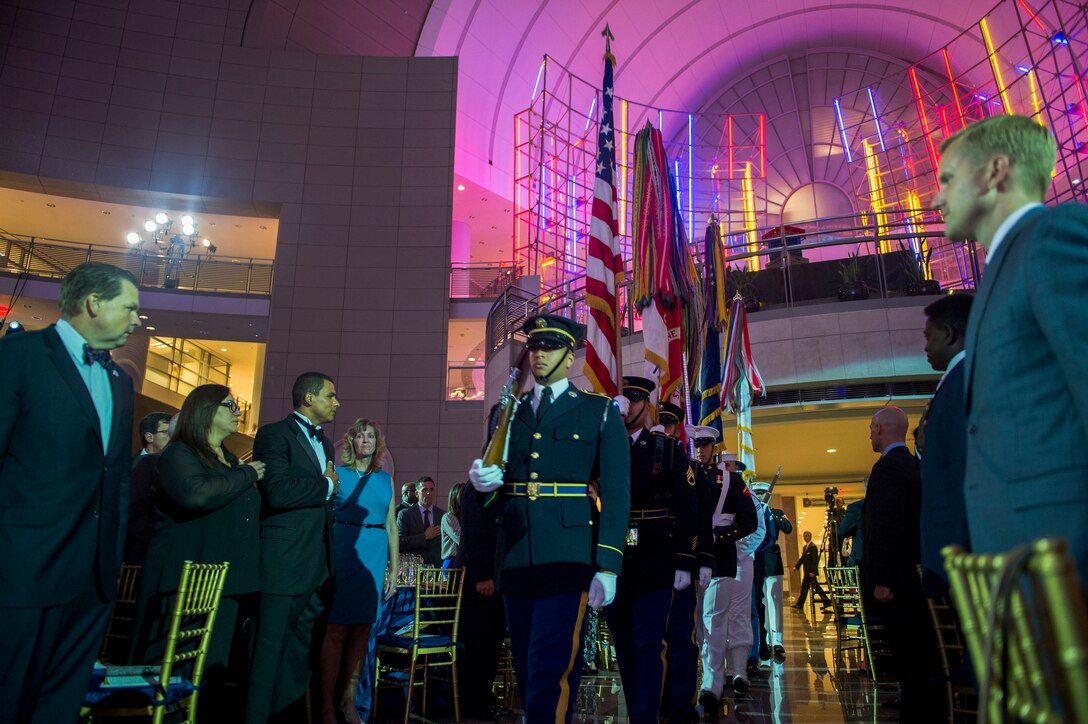 A joint color guard presents the colors during the Fisher House's 25th Anniversary Gala at the Ronald Reagan Building and International Trade Center in Washington, D.C., Sept. 16, 2015 DoD photo by U.S. Air Force Senior Master Sgt. Adrian Cadiz