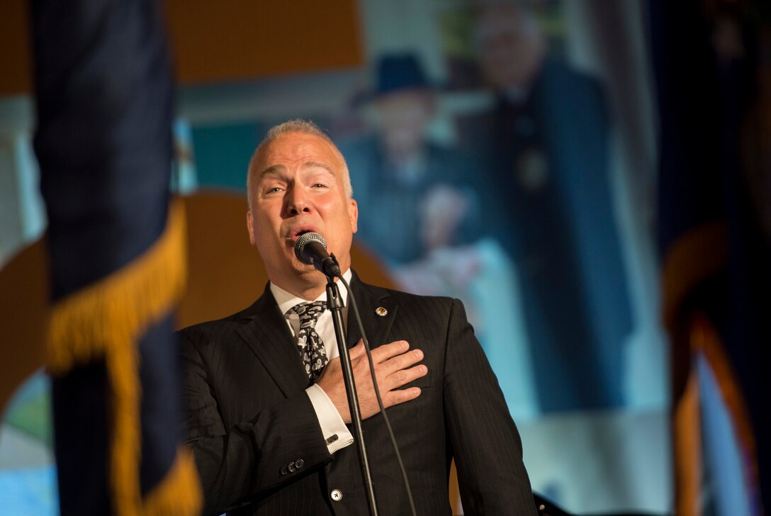 Franc D'Ambrosio sings the national anthem during the Fisher House's 25th Anniversary Gala at the Ronald Reagan Building and International Trade Center in Washington, D.C., Sept. 16, 2015. DoD photo by U.S. Air Force Senior Master Sgt. Adrian Cadiz