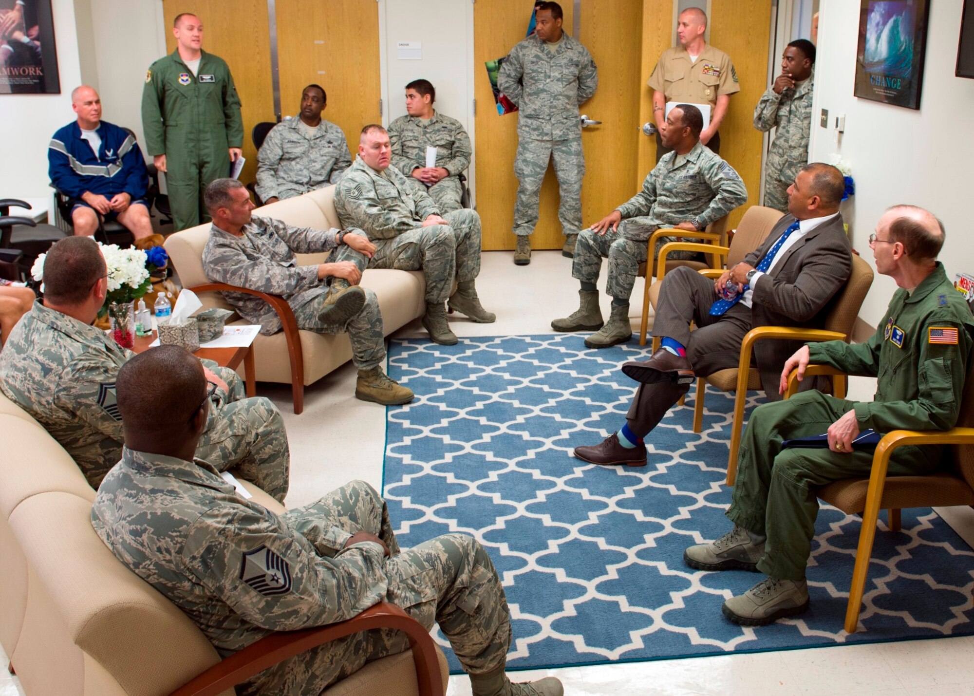James D. Rodriguez, the deputy assistant secretary of defense for warrior care policy, and Maj. Gen. (Dr.) Bart Iddins, 59th Medical Wing commander, field questions from Airmen with the 59th Medical Wing's Airman Medical Transition Unit Sept. 10, 2015 at the Wilford Hall Ambulatory Surgical Center, Joint Base San Antonio-Lackland, Texas. Rodriguez and Iddins wanted to hear about the challenges today’s wounded warriors are facing. (U.S. Air Force photo by Staff Sgt. Kevin Iinuma)