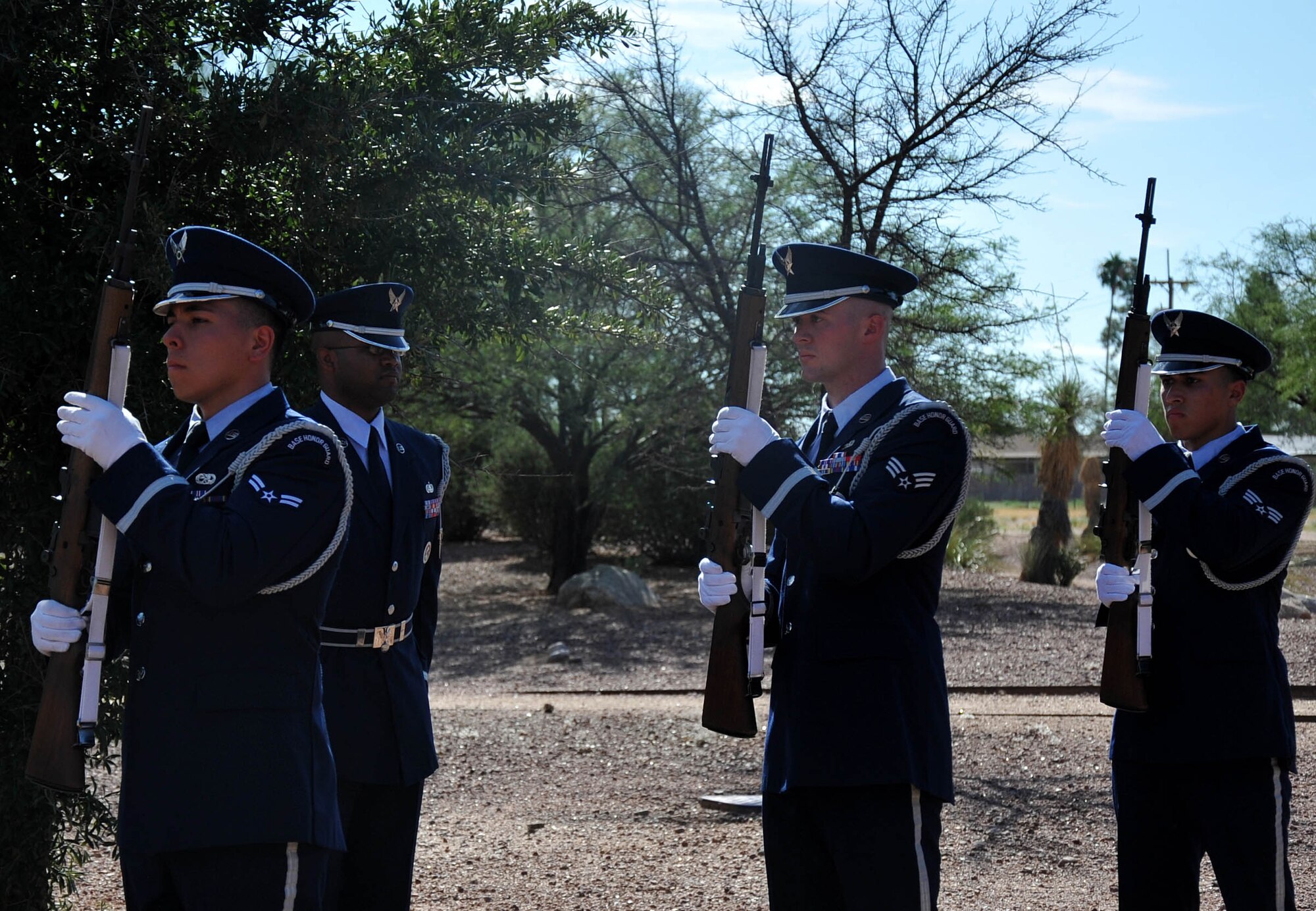 The Davis-Monthan Air Force Base Honor Guard prepare to fire shots during a rifle salute at the memorial ceremony that honored the 15 men who died in the CH-3E Jolly Green Giant helicopter crash on March 12, 1989 during a nighttime mission. Airmen past and from the 943rd Rescue Group paid tribute to the men who lost their lives on PONY 1-2 in a remote desert region 20 miles northwest of Tucson. (U.S. Air Force Photo/ Tech. Sgt. Carolyn Herrick)