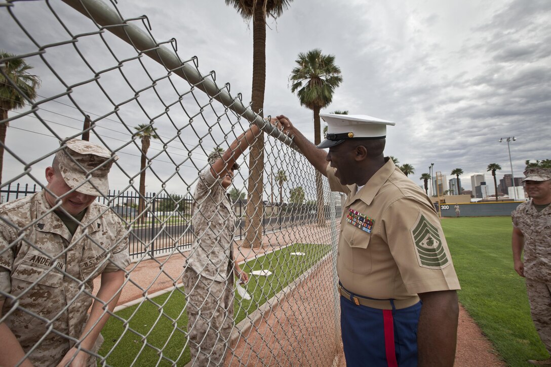 The 18th Sergeant Major of the Marine Corps, Ronald L. Green, visits Marines with 1st Maintenance Battalion, 1st Marine Logistics Group, as they participate in community service projects along side volunteers from Bank of America at University Park in Phoenix, AZ., September 10, 2015. The Marines were in the area as part of Marine Week Phoenix. (U.S. Marine Corps photo by Sgt. Melissa Marnell, Office of the 18th Sergeant Major of the Marine Corps/Released)