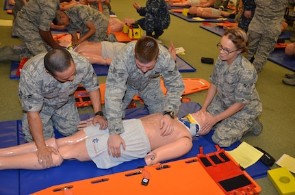 Basic Medical Technician Corpsman Program students practice patient assessment skills Sept. 11, 2015, at the Medical Education and Training Campus at Joint Base San Antonio-Fort Sam Houston. The BMTC Program graduates an average of 11,000 Air Force medics and Navy corpsmen annually.
