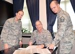 Brig. Gen. Bob LaBrutta (center), commander of the 502nd Air Base Wing and Joint Base San Antonio, signs his Combined Federal Campaign form with the assistance of 2nd Lt. Christina Muncey (left) and Master Sgt. Elliott Velez. Muncey is the wing staff agency CFC project officer and Velez is the installation CFC project officer. The CFC season started Tuesday and runs through Nov. 15. The JBSA goal for this year’s campaign is $3.06 million, Velez said. For more information, contact unit CFC representatives or visit http://www.cfcsanantonio.org.