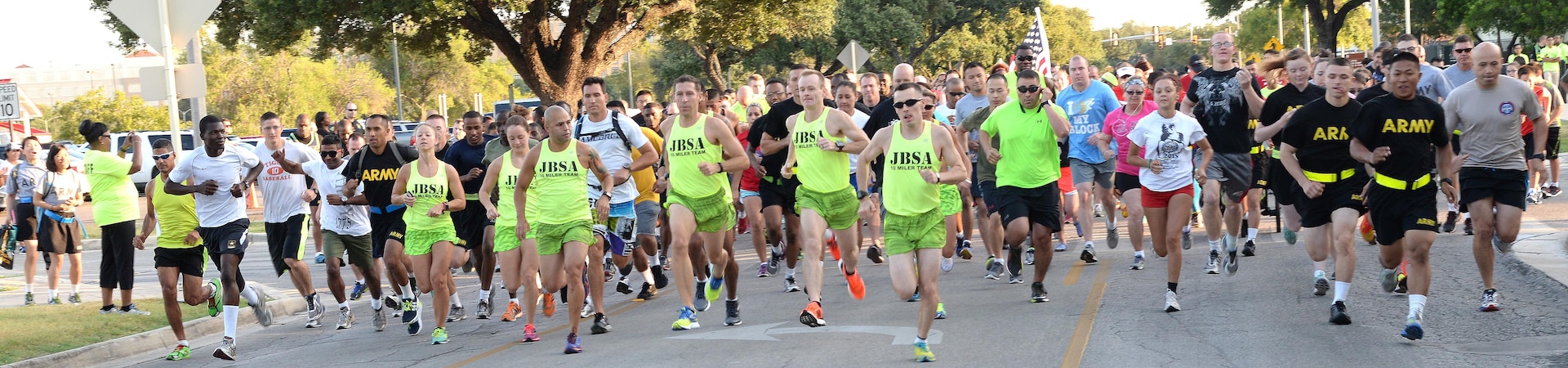 Hundreds of military members, civilian personnel and family members run down Stanley Road during the 2015 5K Run For Life at JBSA-Fort Sam Houston Sunday. Another run took place at Eberle Park on JBSA-Randolph Saturday and the final run is at the Gillum Fitness Center on JBSA-Lackland, with free registration at 7 a.m. and the run beginning at 8 a.m. Sept. 26. The events promote awareness of the resources available to assist service members and their families with fitness, resiliency and suicide prevention. The top three male and female runners will win awards and all participants receive an “I Run For Life” reflective belt and finisher’s dog tag, while supplies last. For more information, visit http://www.facebook.com/JBSArunforlife and http://www.facebook.com/JointBaseSanAntonio.