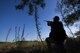Staff Sgt. Daniel Cole, 364th Training Squadron instructor, points his shotgun at a dove passing by during the dove hunt portion of the Clay County Dove Salute in Henrietta, Texas, Sept. 12, 2015. Airmen were invited to the Birdwell and Clark Ranch to participate in dove hunt and a Texas-style steak dinner. (U.S. Air Force photo by Senior Airman Kyle Gese)