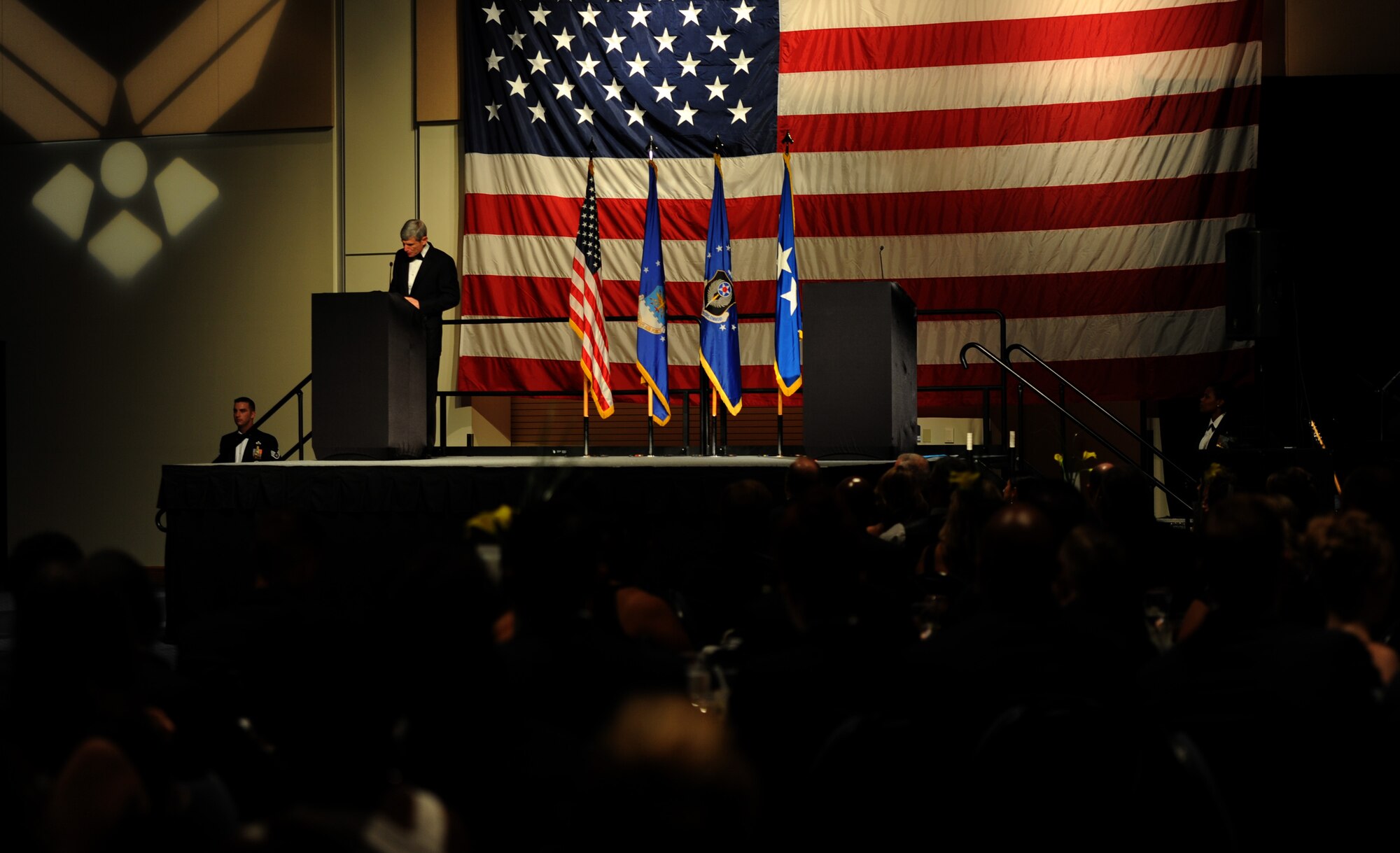 Retired Gen. Norty Schwartz, 19th Chief of Staff of the Air Force, speaks to more than 900 personnel during an Air Force Ball at the Emerald Coast Convention Center, Ft. Walton Beach, Fla., Sept. 12, 2015. Hosted by the 1st Special Operations Wing, Air Force Ball attendees celebrated the high standards set by yesterday's Airmen through dedication to duty and innovation to succeed, today's diverse Airmen who stand ready to fly, fight and win against worldwide threats in air, space and cyberspace, and tomorrow's Airmen who will succeed through capability and flexibility in a future of unpredictability. (U.S. Air Force Photo by Staff Sgt. Katherine Holt)