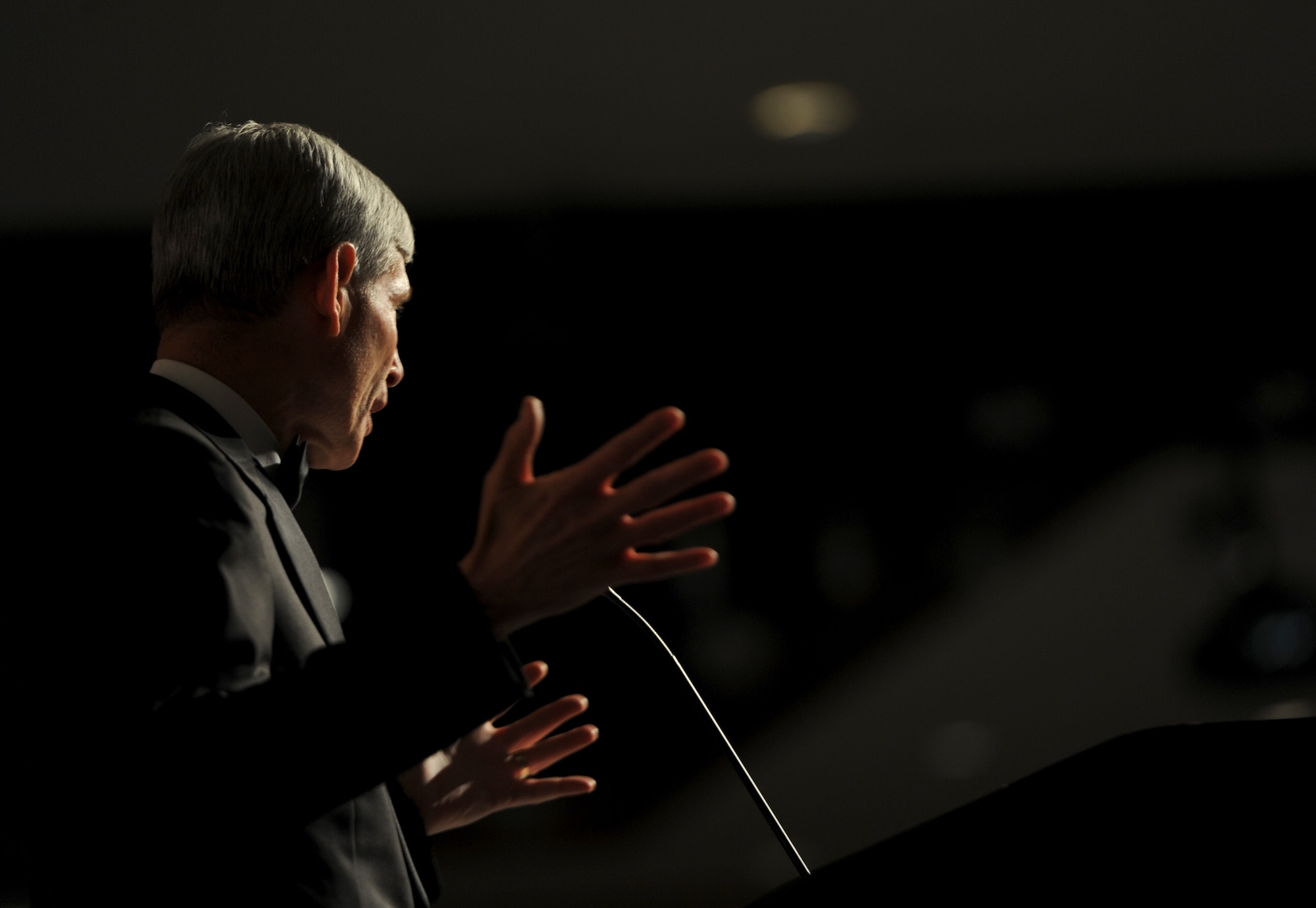 Retired Gen. Norty Schwartz, 19th Chief of Staff of the Air Force, speaks to more than 900 personnel during an Air Force Ball at the Emerald Coast Convention Center, Ft. Walton Beach, Fla., Sept. 12, 2015. Hosted by the 1st Special Operations Wing, Air Force Ball attendees celebrated the high standards set by yesterday's Airmen through dedication to duty and innovation to succeed, today's diverse Airmen who stand ready to fly, fight and win against worldwide threats in air, space and cyberspace, and tomorrow's Airmen who will succeed through capability and flexibility in a future of unpredictability. (U.S. Air Force Photo by Staff Sgt. Katherine Holt)