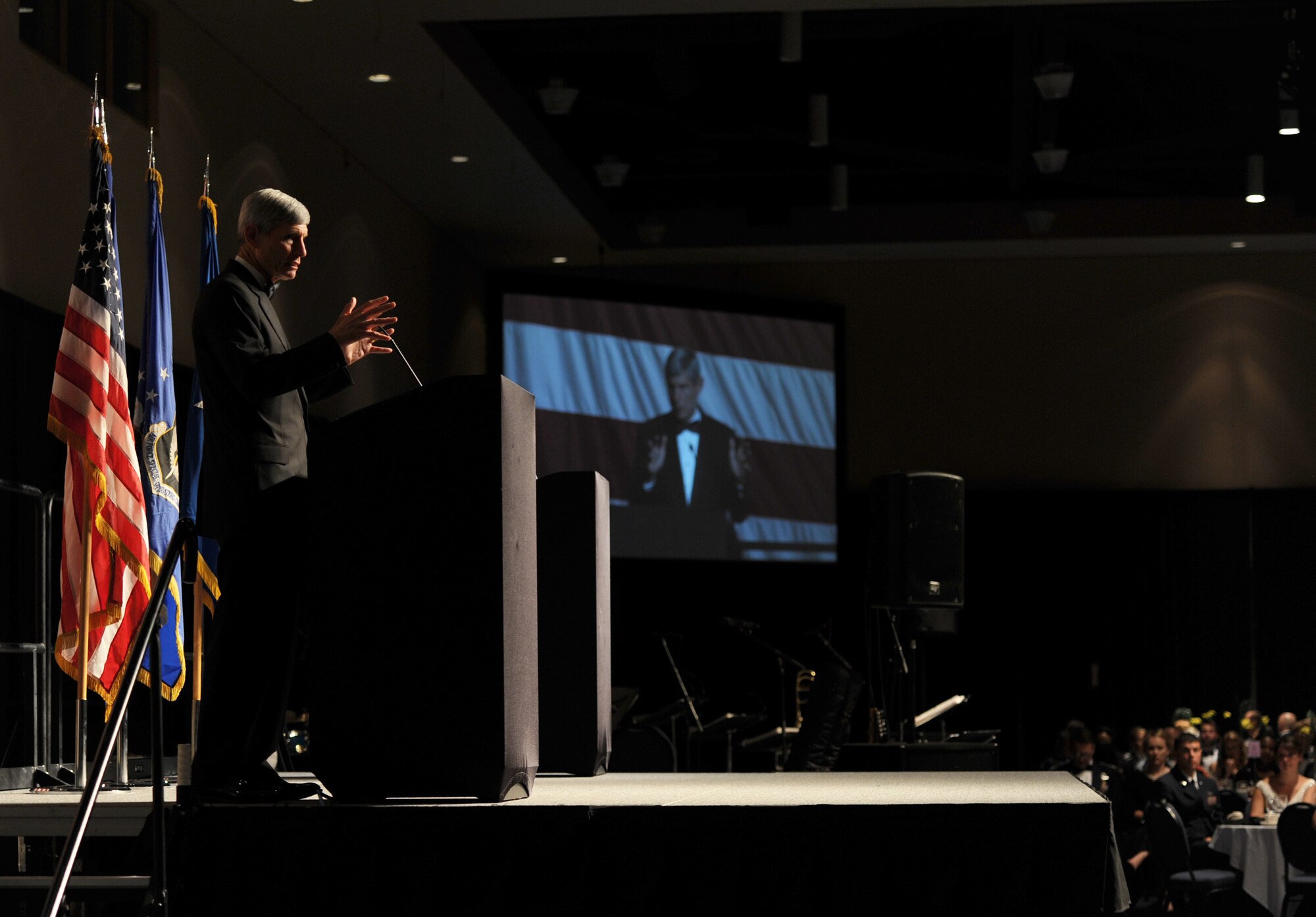 Retired Gen. Norty Schwartz, 19th Chief of Staff of the Air Force, speaks to more than 900 personnel during an Air Force Ball at the Emerald Coast Convention Center, Ft. Walton Beach, Fla., Sept. 12, 2015. Hosted by the 1st Special Operations Wing, Air Force Ball attendees celebrated the high standards set by yesterday's Airmen through dedication to duty and innovation to succeed, today's diverse Airmen who stand ready to fly, fight and win against worldwide threats in air, space and cyberspace, and tomorrow's Airmen who will succeed through capability and flexibility in a future of unpredictability. (U.S. Air Force Photo by Staff Sgt. Katherine Holt)