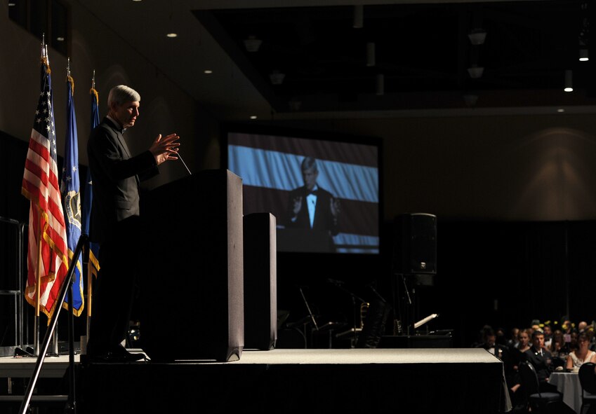 Retired Gen. Norty Schwartz, 19th Chief of Staff of the Air Force, speaks to more than 900 personnel during an Air Force Ball at the Emerald Coast Convention Center, Ft. Walton Beach, Fla., Sept. 12, 2015. Hosted by the 1st Special Operations Wing, Air Force Ball attendees celebrated the high standards set by yesterday's Airmen through dedication to duty and innovation to succeed, today's diverse Airmen who stand ready to fly, fight and win against worldwide threats in air, space and cyberspace, and tomorrow's Airmen who will succeed through capability and flexibility in a future of unpredictability. (U.S. Air Force Photo by Staff Sgt. Katherine Holt)