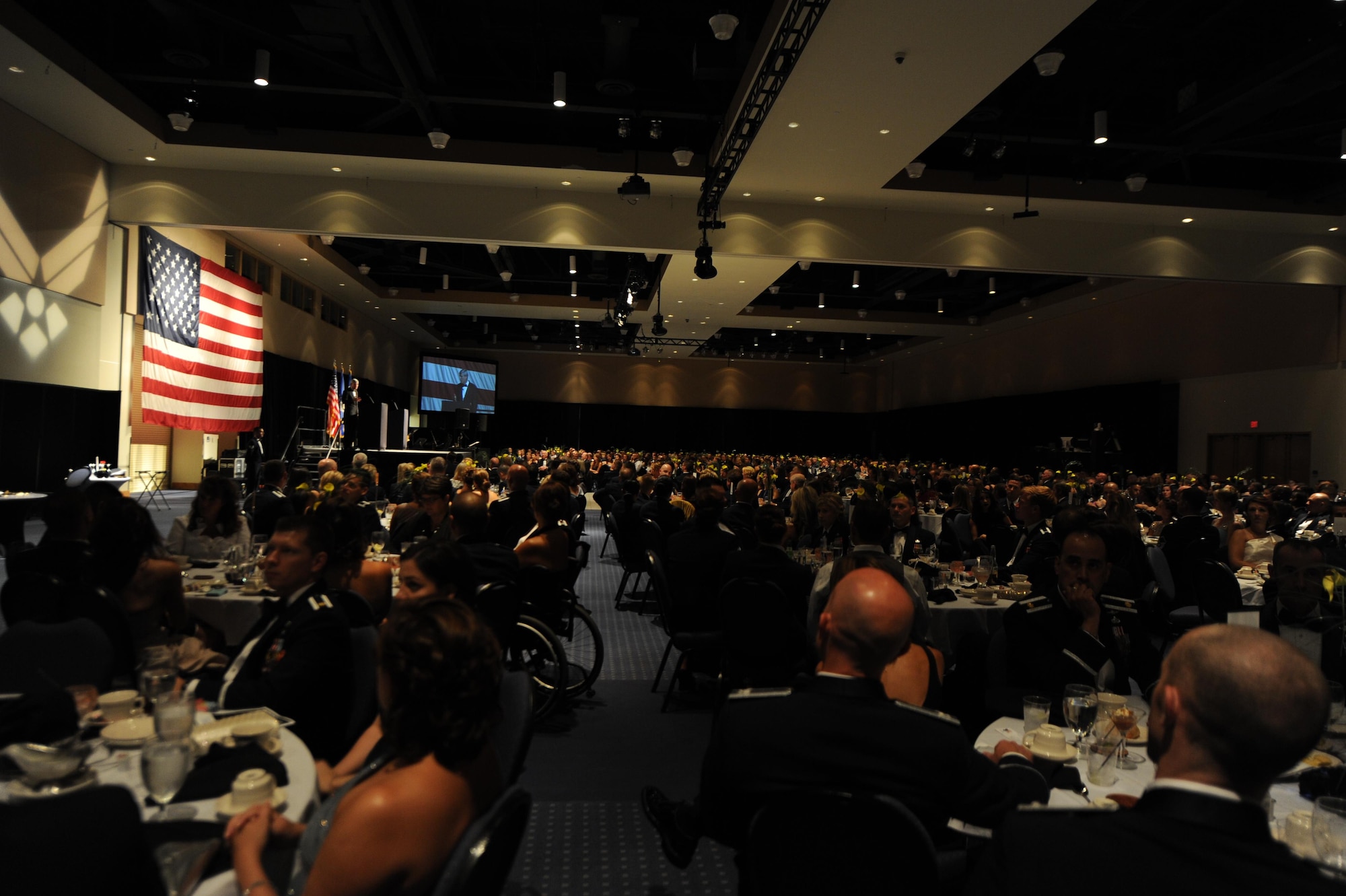 More than 900 Hurlburt personnel celebrated the Air Force's 68th Birthday, Air Force Special Operations Command's 25th Anniversary and the Year of the Air Commando with guest speaker, retired Gen. Norty Schwartz, 19th Chief of Staff of the Air Force, during an Air Force Ball at the Emerald Coast Convention Center, Ft. Walton Beach, Fla., Sept. 12, 2015. Hosted by the 1st Special Operations Wing, Air Force Ball attendees celebrated the high standards set by yesterday's Airmen through dedication to duty and innovation to succeed, today's diverse Airmen who stand ready to fly, fight and win against worldwide threats in air, space and cyberspace, and tomorrow's Airmen who will succeed through capability and flexibility in a future of unpredictability. (U.S. Air Force Photo by Staff Sgt. Katherine Holt)