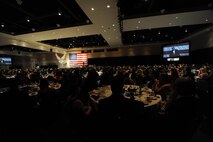 More than 900 Hurlburt personnel celebrated the Air Force's 68th Birthday, Air Force Special Operations Command's 25th Anniversary and the Year of the Air Commando with guest speaker, retired Gen. Norty Schwartz, 19th Chief of Staff of the Air Force, during an Air Force Ball at the Emerald Coast Convention Center, Ft. Walton Beach, Fla., Sept. 12, 2015. Hosted by the 1st Special Operations Wing, Air Force Ball attendees celebrated the high standards set by yesterday's Airmen through dedication to duty and innovation to succeed, today's diverse Airmen who stand ready to fly, fight and win against worldwide threats in air, space and cyberspace, and tomorrow's Airmen who will succeed through capability and flexibility in a future of unpredictability. (U.S. Air Force Photo by Staff Sgt. Katherine Holt)