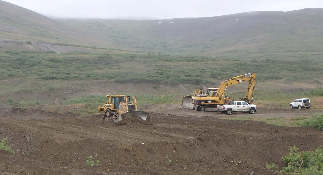 Heavy equipment prepares a landfarming cell near the Tank Site E project near Nome, Alaska. Landfarming is a potential solution to meet the needs of the U.S. Army Corps of Engineers – Alaska District’s Formerly Used Defense Sites program across Alaska. The process includes removing contaminated soil from the source location, spreading it across an expansive area one to two feet thick, tilling consistently and then letting nature take control to degrade the pollutants.