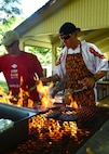 Master Sgt. Paul Weyandt, 792nd Intelligence Squadron first sergeant, (left) Master Sgt. Kurt Ward, 25th Air Support Operations Squadron first sergeant, prepare hamburgers during the Airmen’s Fall Fest at Vossler Park on Joint Base Pearl Harbor-Hickam, Hawaii, Sept. 17, 2015. In its first year, the Fall Fest featured the Pacific Air Force Band, a variety of games, Alcohol and Drug Abuse Prevention & Treatment sponsored drunk goggles go cart races, Football toss, wheel of fortune, and the commanders relay challenge. (U.S. Air Force photo by Tech. Sgt. Aaron Oelrich/Released)   