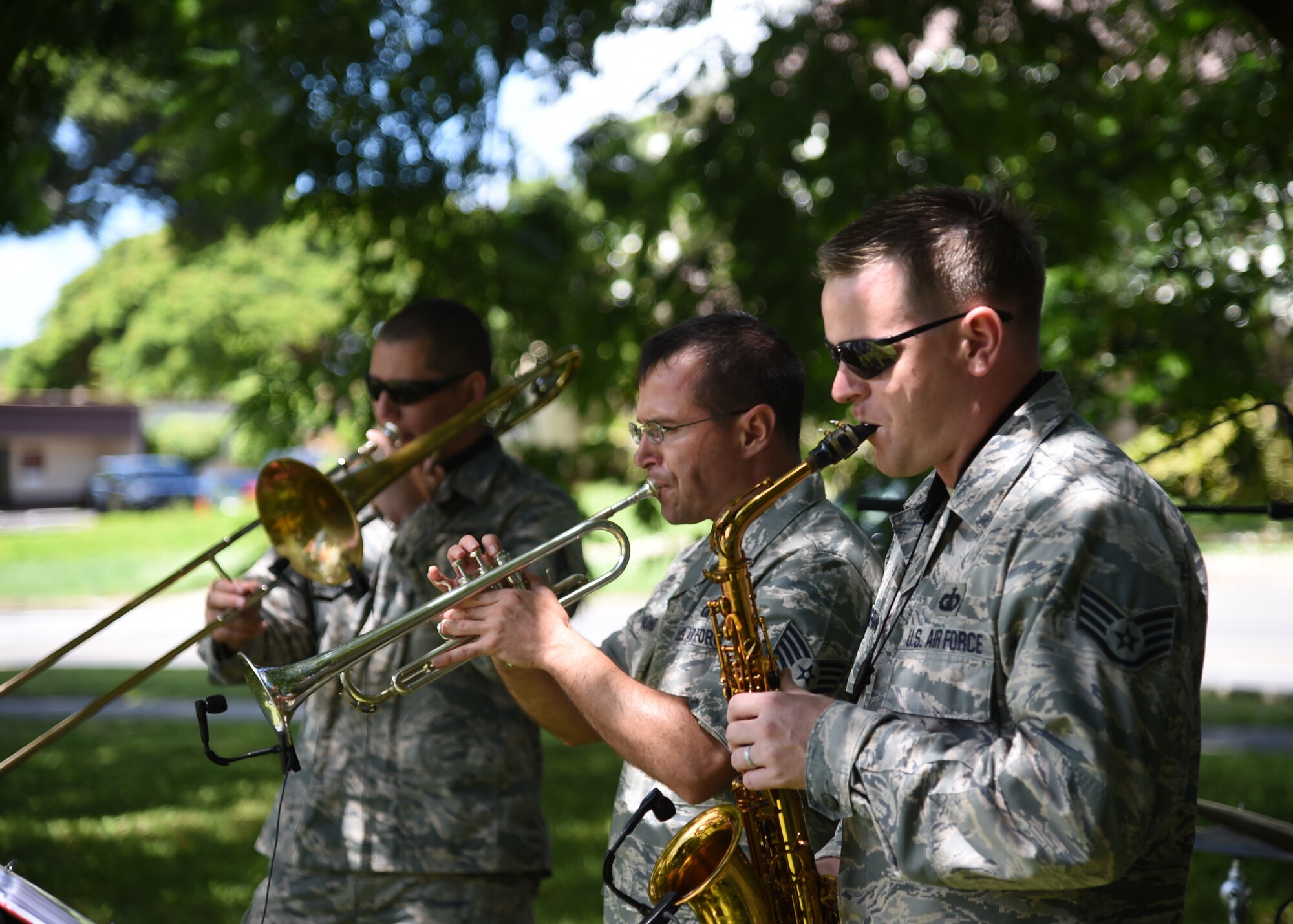 Members of the Air Force Band of the Pacific play during the Airmen’s Fall Fest at Vossler Park on Joint Base Pearl Harbor-Hickam, Hawaii, Sept. 17, 2015. In its first year, the Fall Fest featured the Pacific Air Force Band, a variety of games, Alcohol and Drug Abuse Prevention & Treatment sponsored drunk goggles go cart races, Football toss, wheel of fortune, and the commanders relay challenge. (U.S. Air Force photo by Tech. Sgt. Aaron Oelrich/Released)        