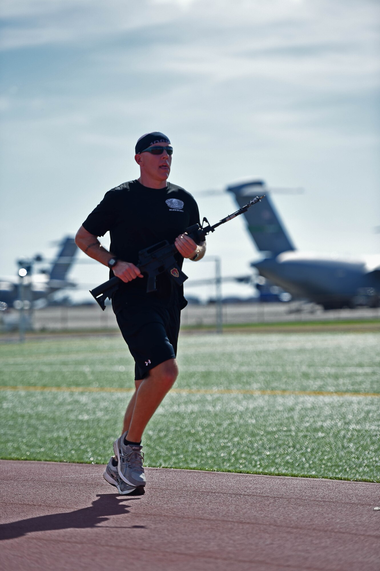 Master Sgt. Kurt Ward, first sergeant from the 25th Air Support Operations Squadron, runs during the 24 hour Prisoner of War and Missing In Action remembrance run on Joint Base Pearl Harbor-Hickam, Hawaii, Sept. 17, 2015. The 24 hour POW/MIA remembrance run was organized by the 25th Air Support Operations Squadron as a part of POW/MIA week and National POW/MIA Day. Every year the nation pauses on the third Friday of September to remember the sacrifices and service of prisoners of war. There are 83,344 Americans still unaccounted-for across the Defense Department. (U.S. Air Force photo by Tech. Sgt. Aaron Oelrich/Released)   