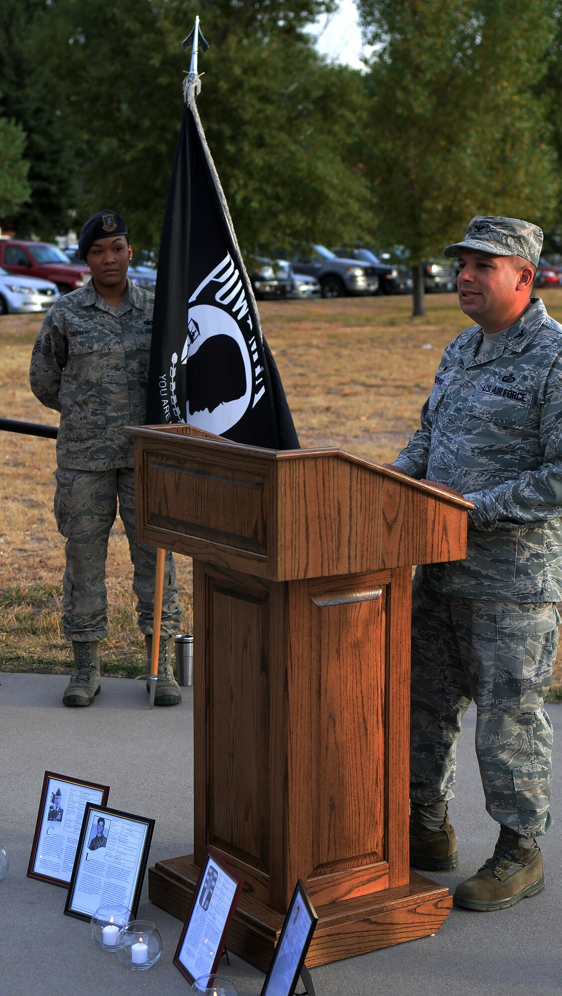 Col. Frank Verdugo, 90th Mission Support Group commander, speaks to a group of Airmen before the beginning of the 2015 Prisoners of War/Missing in Action Memorial Walk and Vigil on the Argonne Parade Field on F.E. Warren Air Force Base, Wyo., Sept. 16, 2015. Military installations country wide conducted events in observance of POW/MIA remembrance week. (U.S. Air Force photo by Airman 1st Class Brandon Valle)