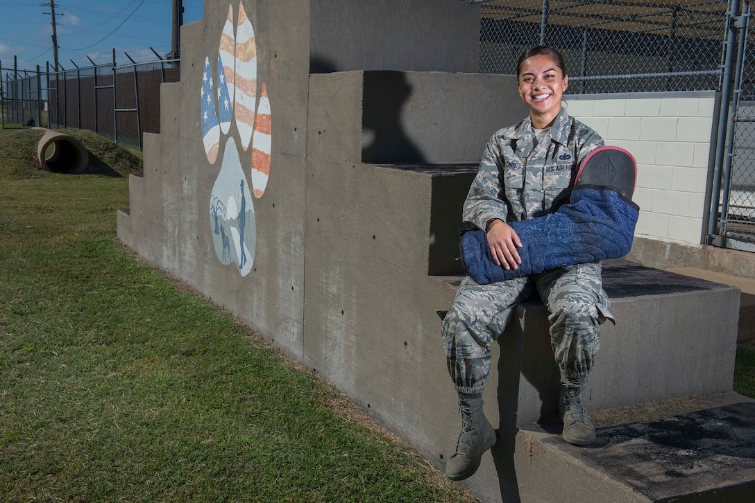 Staff Sgt. Lorri Lyons is the Support Airman of the Week at Sheppard Air Force Base, Texas, for the week of Sept. 15-21, 2015. Lyons is a military working dog trainer with the 82nd Security Forces Squadron that equips their dogs and handlers with the skills necessary to prevent terrorist or extremist violence. (U.S. Air Force photo by Senior Airman Kyle Gese/Released)