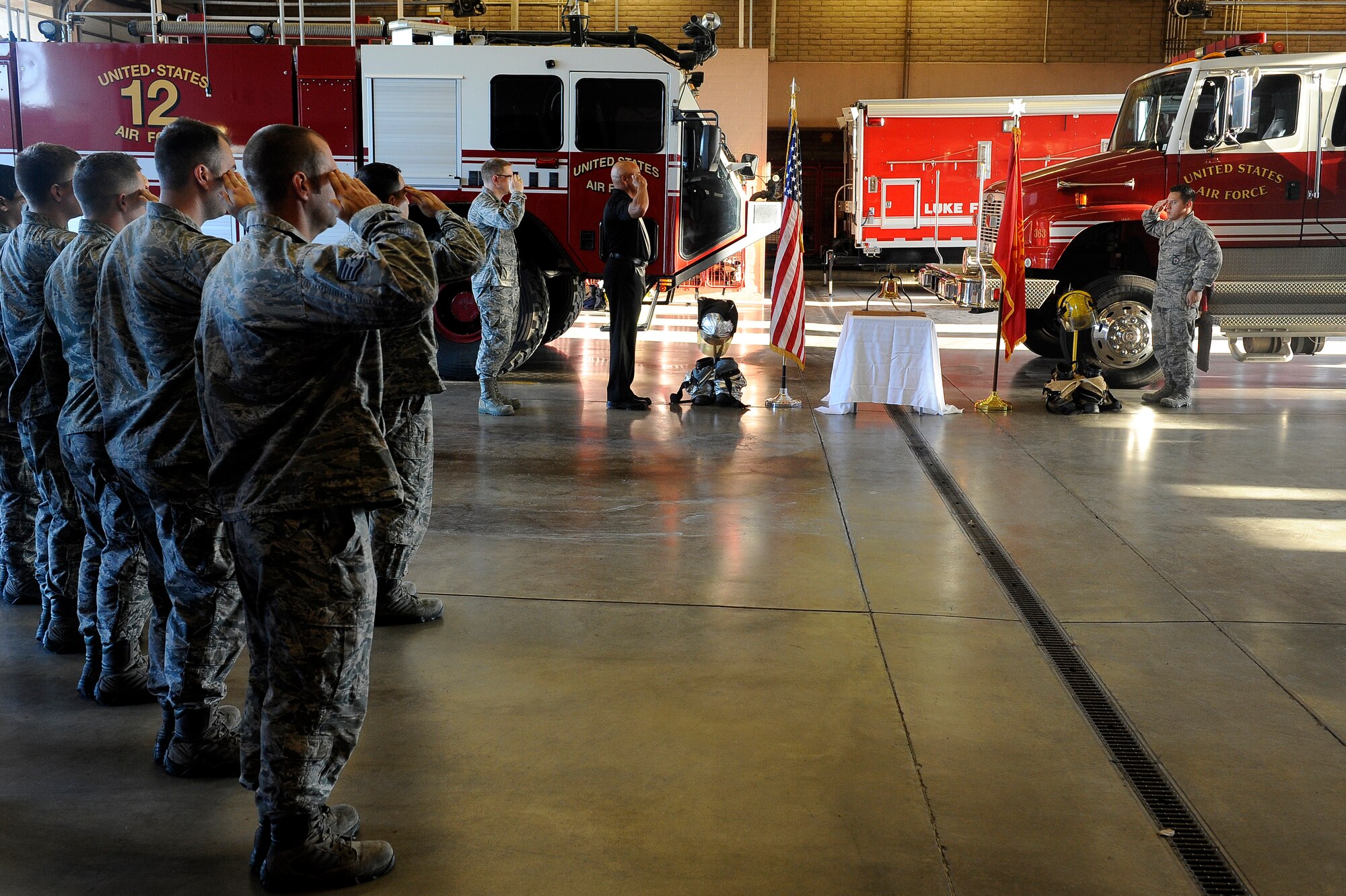 The 56th Civil Engineer Squadron leaders and firefighters conduct a final roll call Sept. 11, 2015 at Luke Air Force Base, Arizona. This heartfelt ceremony has been performed annually for the past 14 years to remember those that fell and risked their lives at ground zero. (U.S. Air Force photo by Airman 1st Class Pedro Mota)