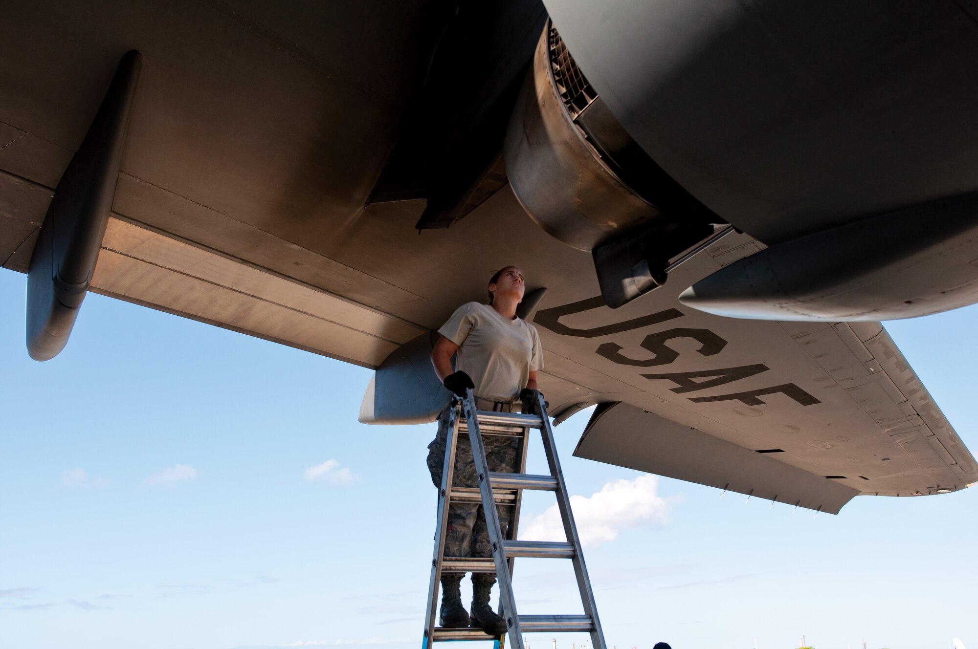 Tech. Sgt. Johanna Aponte, 514th Aircraft Maintenance Squadron, inspects an engine on a C-17 Globemaster III during a training mission Aug. 30. (U.S. Air Force photo by Senior Airman Jasmine Zielomski)