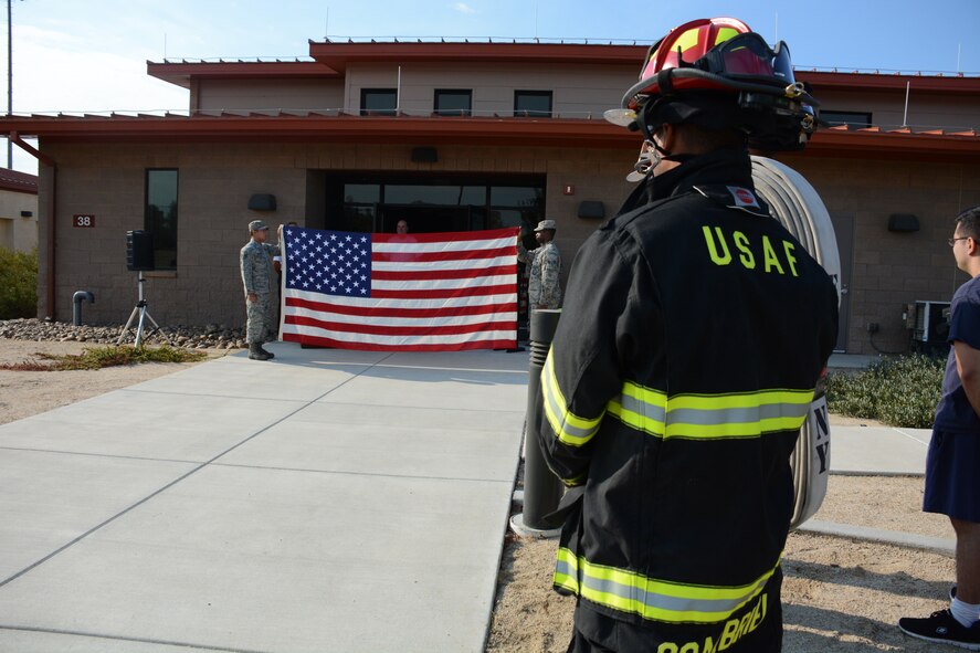 A flag ceremony was held Sept. 11 at the Firefighter Run for the Fallen at Travis Air Force Base, California. (U.S. Air Force photo by Airman 1st Class Amber Carter)