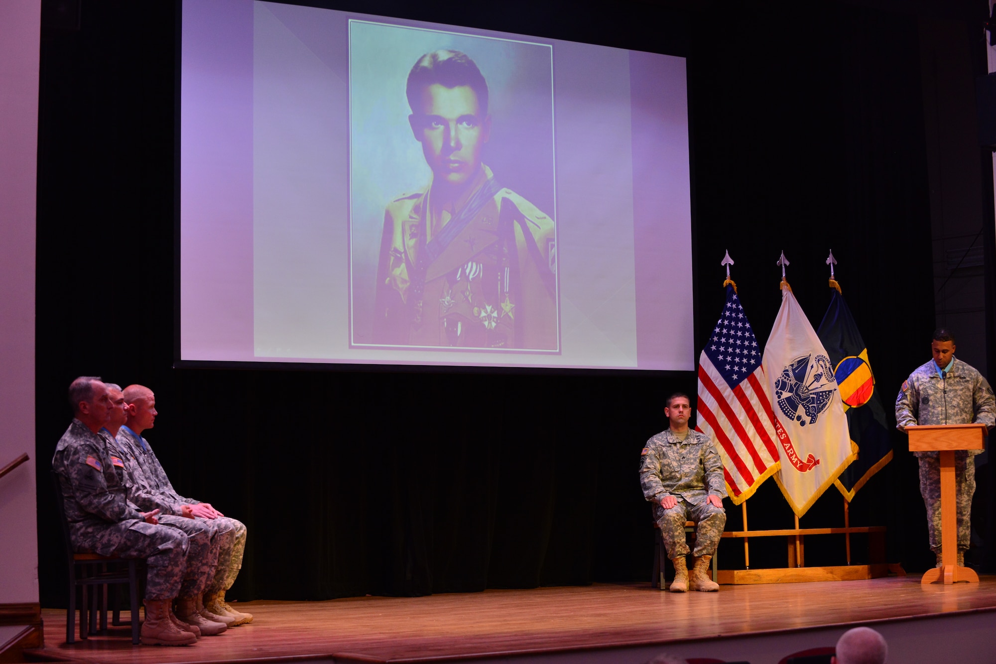 U.S. Army Training and Doctrine Command leadership and Members of the Sergeant Audie Murphy Club induct a new member during an induction ceremony at Fort Eustis, Va., Sept. 15, 2015. During the induction, U.S. Army Command Sgt. Maj. David S. Davenport Sr., U.S. Army Training and Doctrine Command command sergeant major, spoke of the significance and dedication it takes for a team member to earn membership into the club. (U.S. Air Force photo by Staff Sgt. Natasha Stannard/Released)