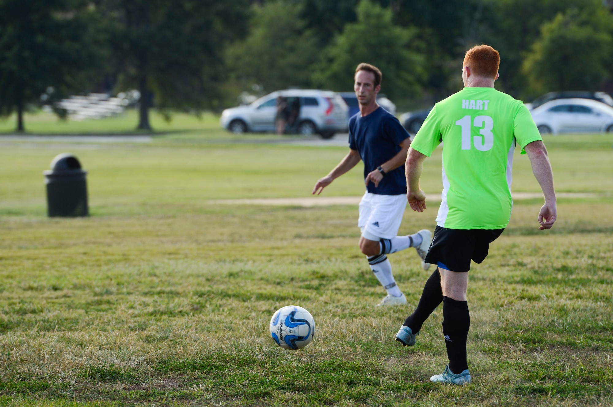 U.S. Air Force Staff Sgts. Daniel Pelrine and Patrick Hart, Joint Base Langley-Eustis soccer team captains, participate in a warm-up drill prior to practice at Langley Air Force Base, Va., Aug. 25, 2015. The team participated in the 14th Annual Defender’s Cup Military Soccer Tournament hosted by Joint Base San Antonio-Lackland, Texas. (U.S. Air Force photo by Senior Airman Kayla Newman/Released)